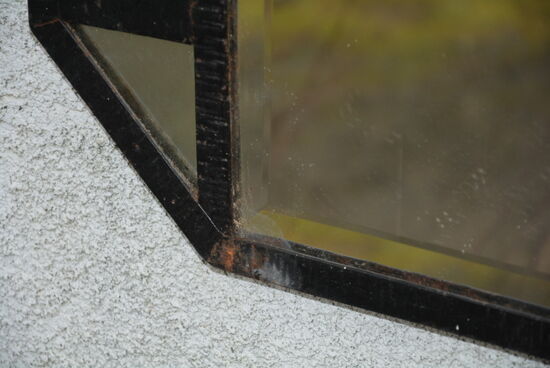 Bevelled mirror in wrought iron 92x48cm