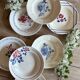 Set of 8 mismatched vintage soup plates