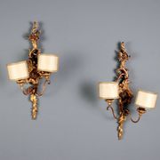 Antique wall sconces in carved lacquered and gilded wood, Italy, 20th century.