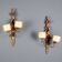 Antique wall sconces in carved lacquered and gilded wood, Italy, 20th century.