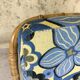 Fauteuil vintage en rotin et tissu à fleurs