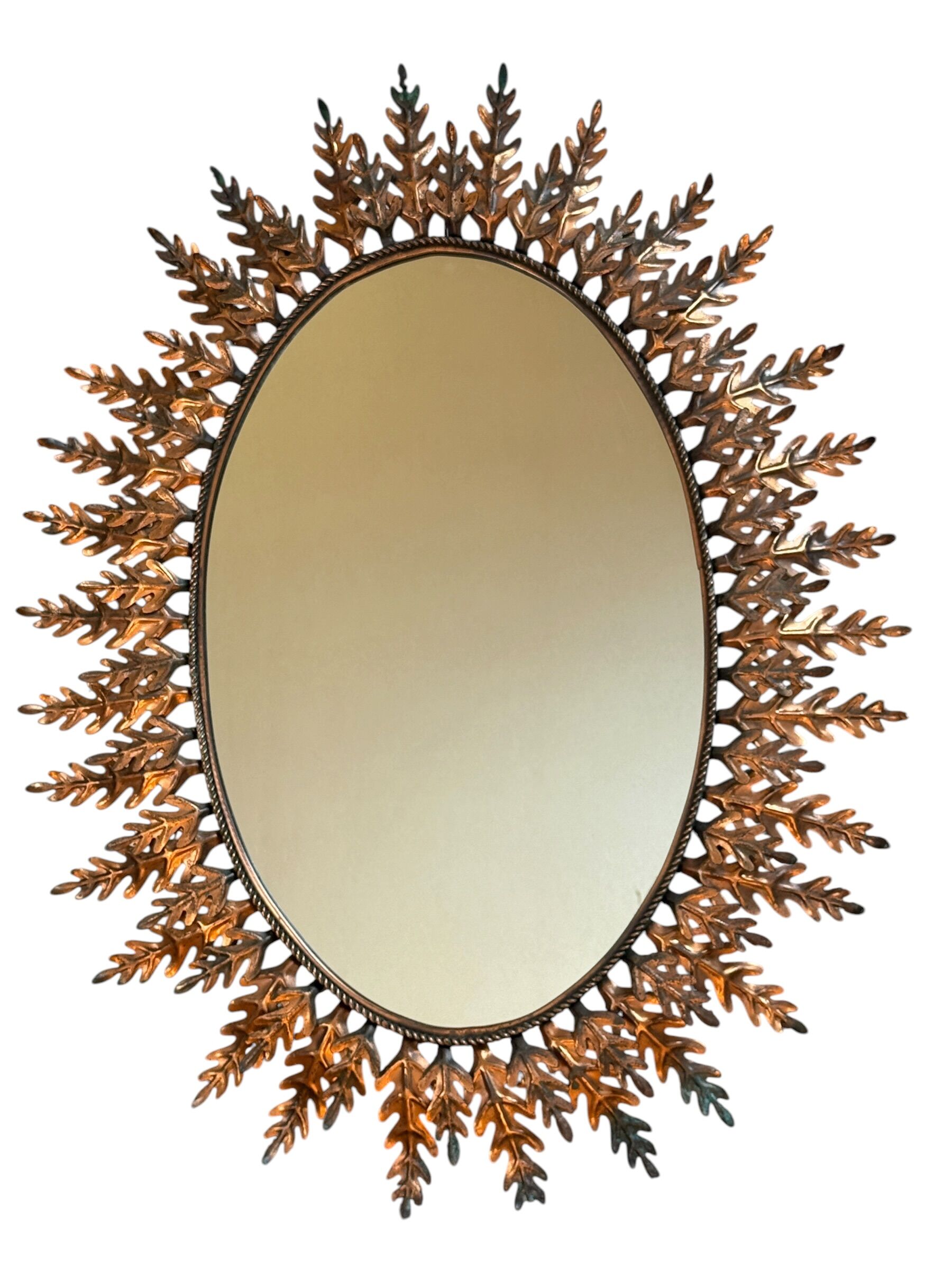Oval sun mirror wrought iron from the 1950s Italy