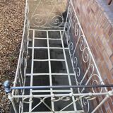Wrought iron cot