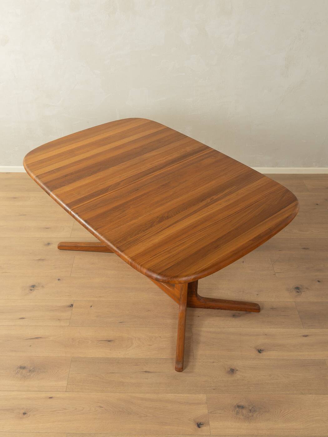 Glostrup dining table, 1980s, solid teak, by Johs. Kristoffersen & Søn, with two extension leaves