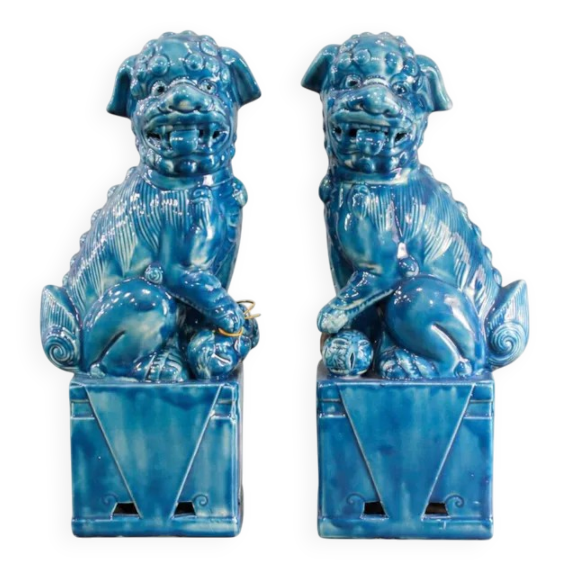 Pair of Foo dog bookends in turquoise glazed ceramic, Manises