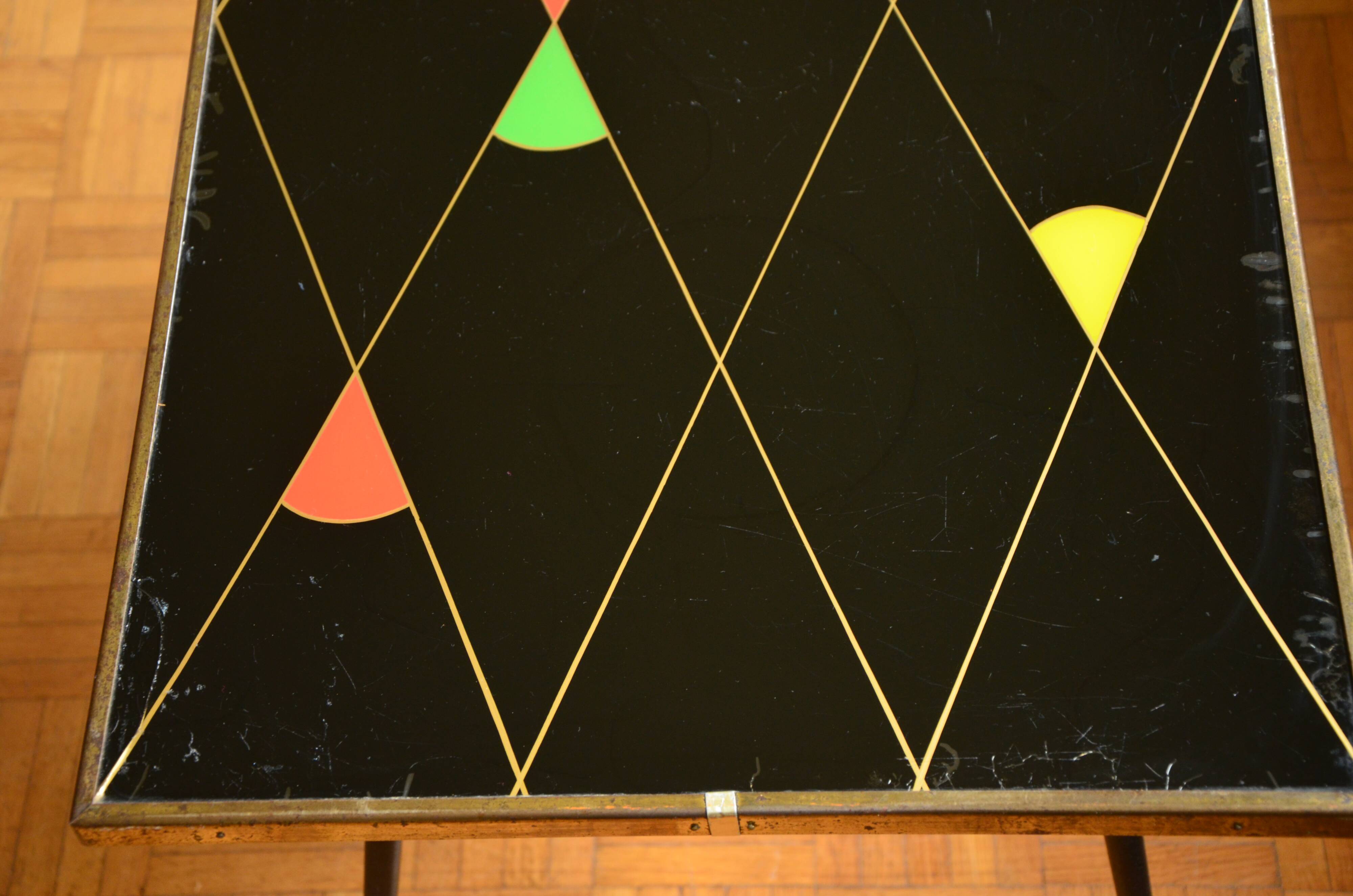 Brass and glass coffee table with compass feet