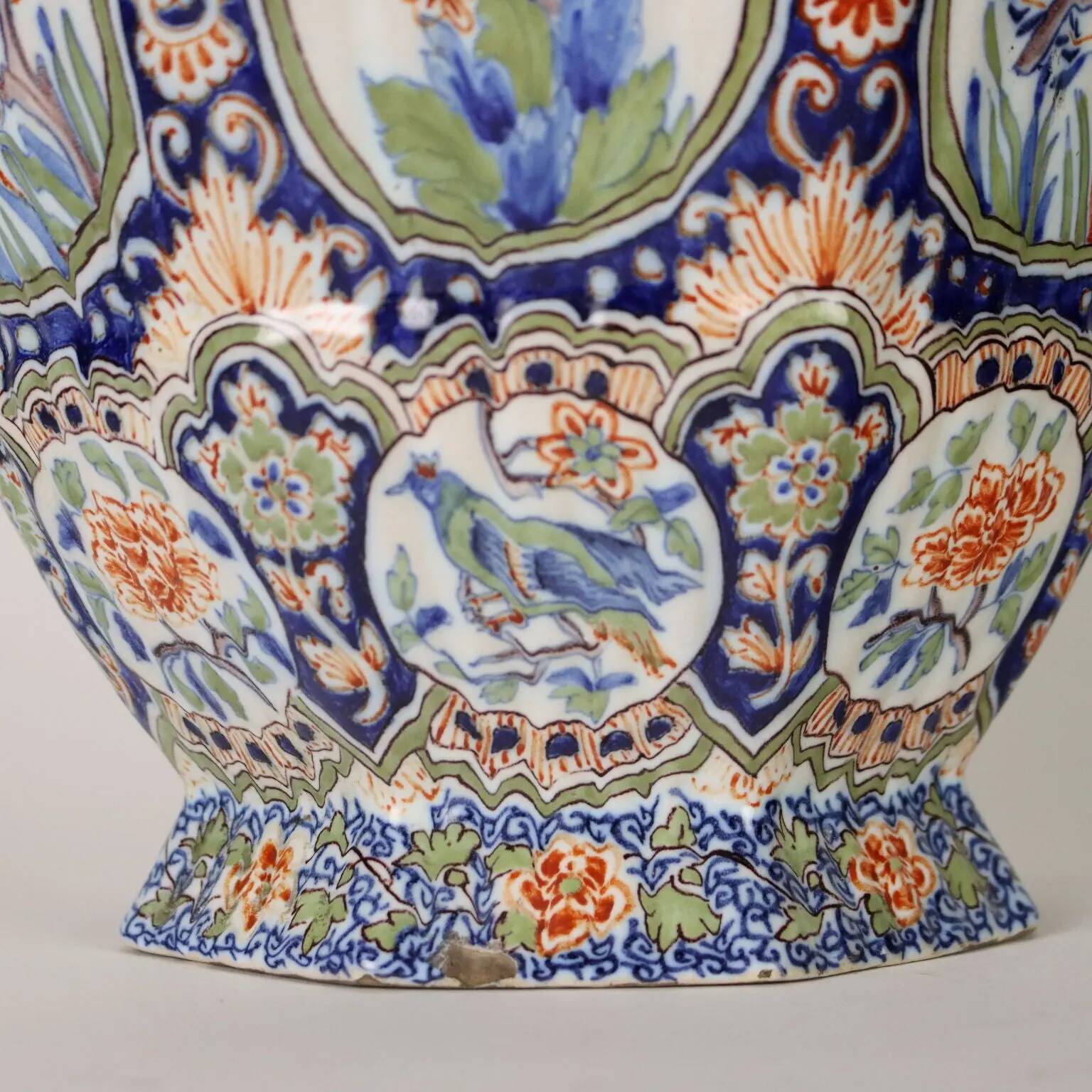 Ancient vase fully decorated with ceramic plants, 20th century.
