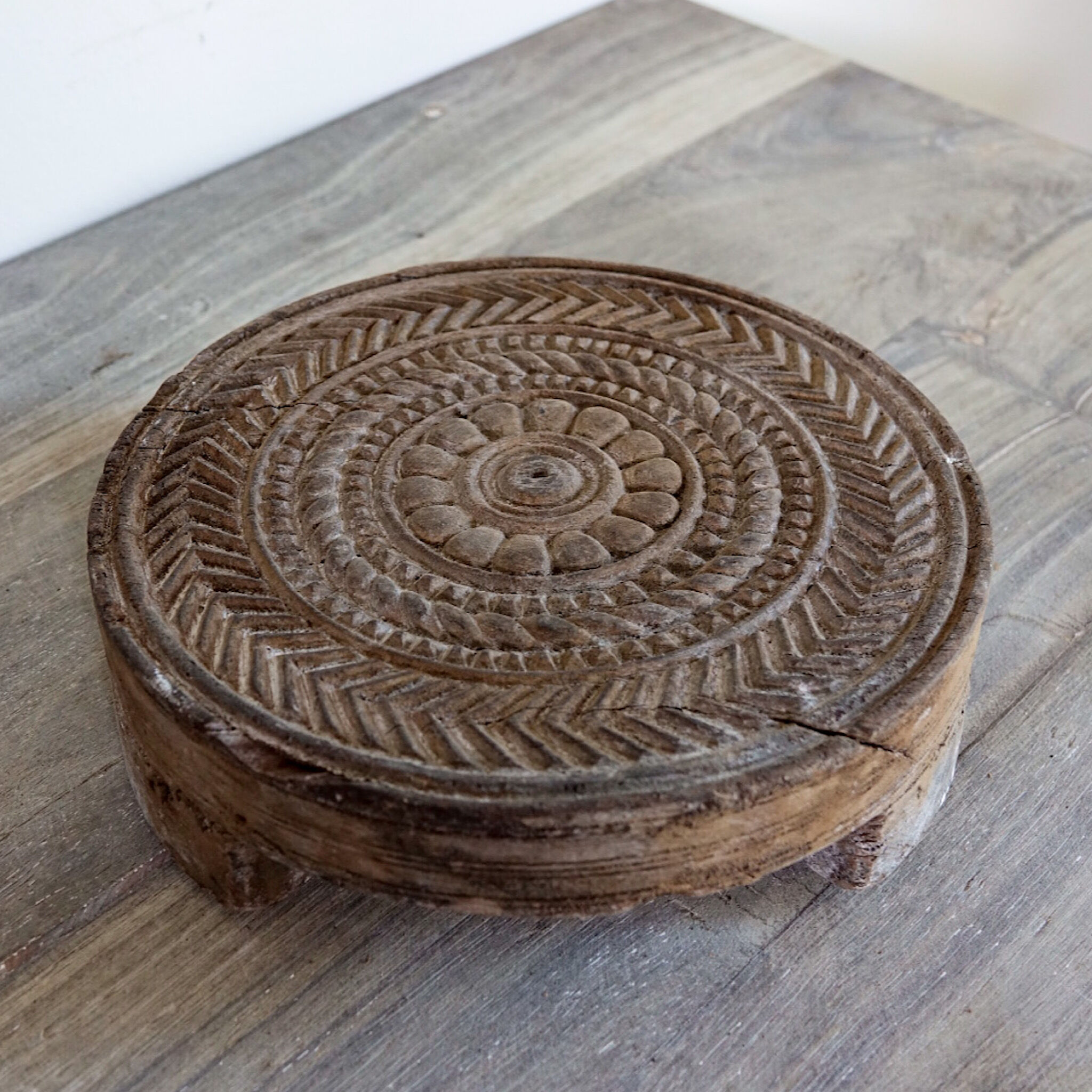 Carved wooden chapatis board