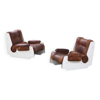 Set of two vintage mid century modern leather lounge arm chairs, 1960s-70s