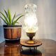 Vintage tripod table lamp from the 1960s with a glass lampshade.