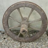 Old wooden cart wheel