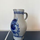 Grey pitcher and bleur in Alsace sandstone