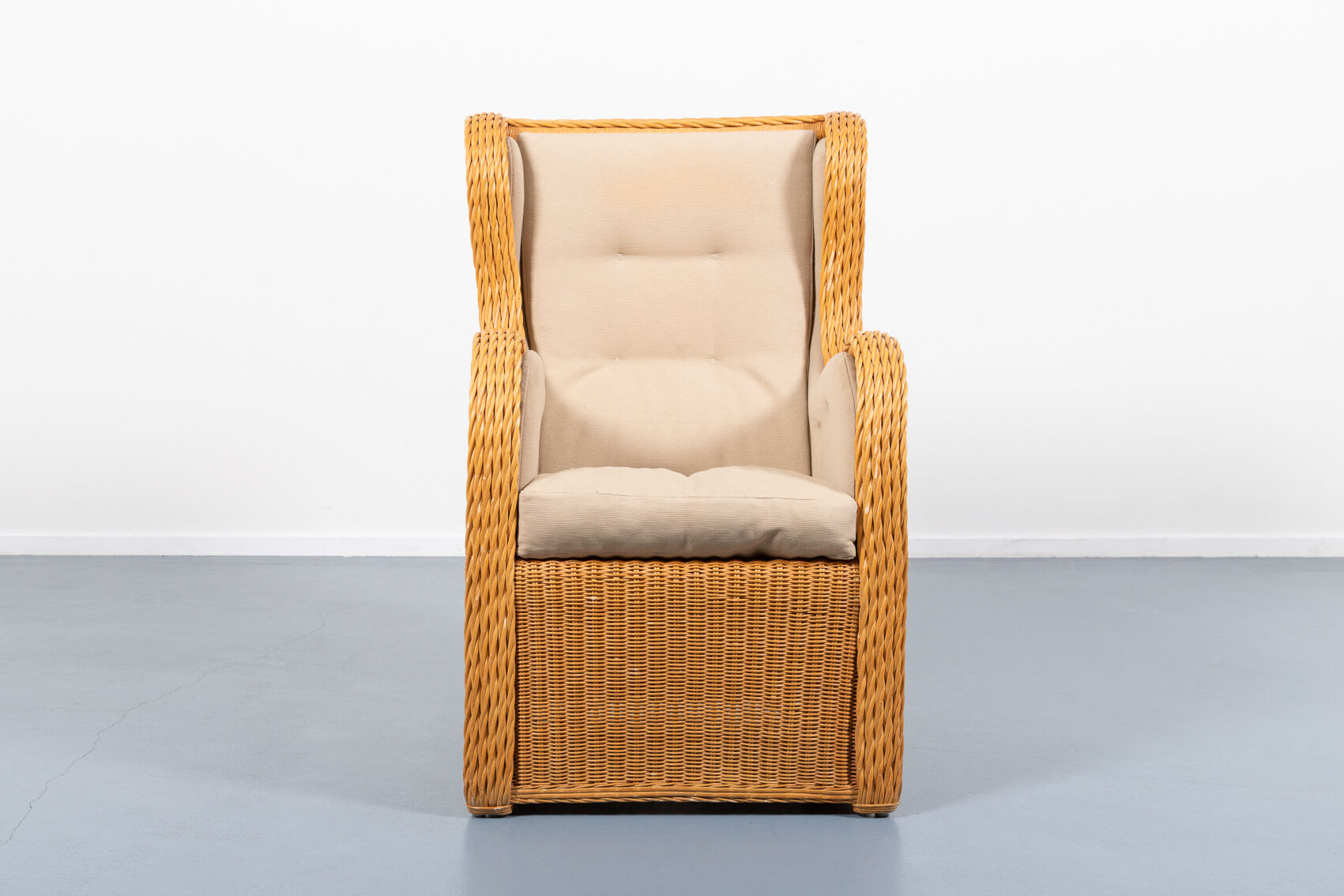 Vintage lounge armchair in wicker Italian design