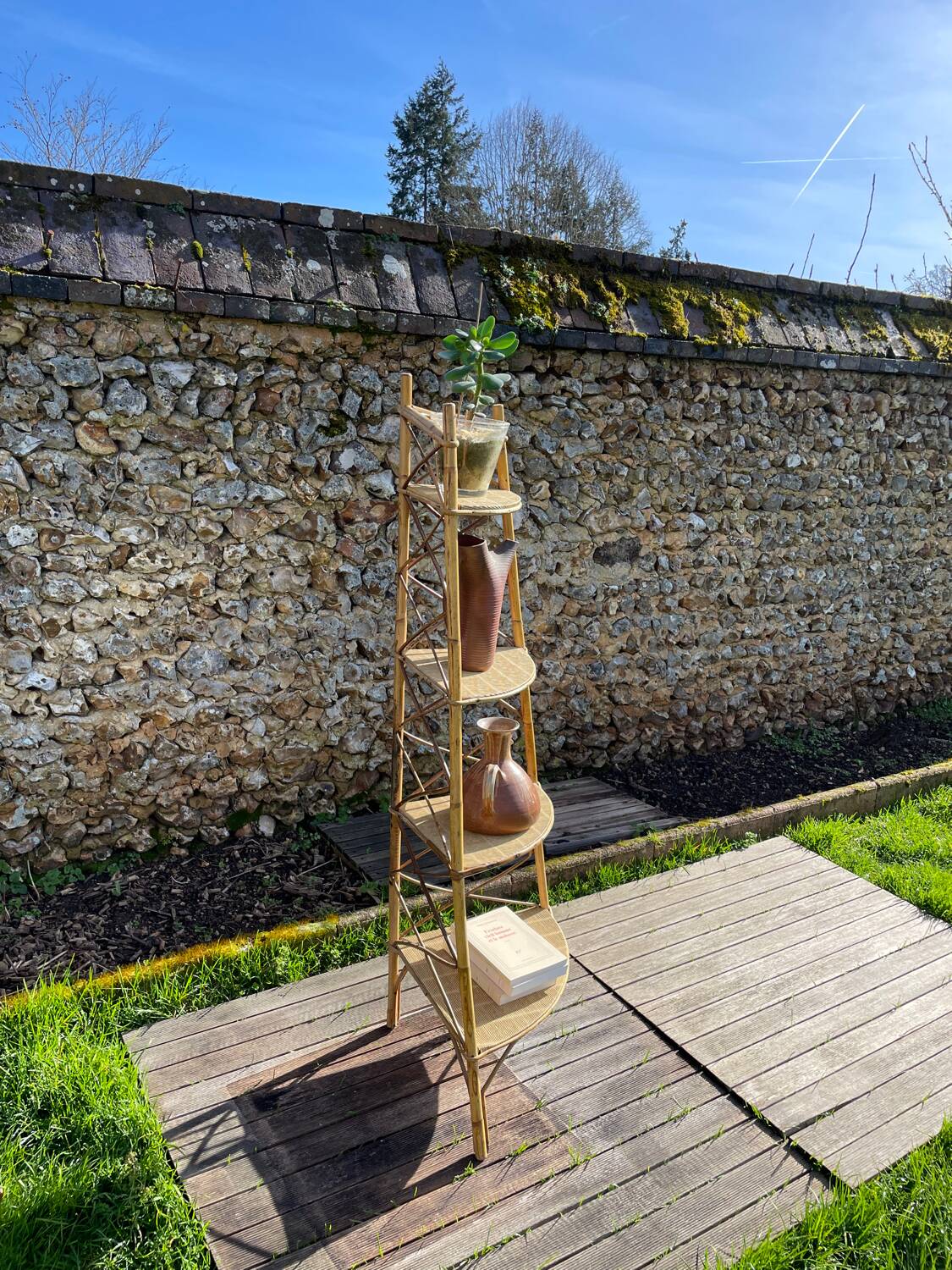 Audoux Minnet style corner shelf in vintage rattan 1950