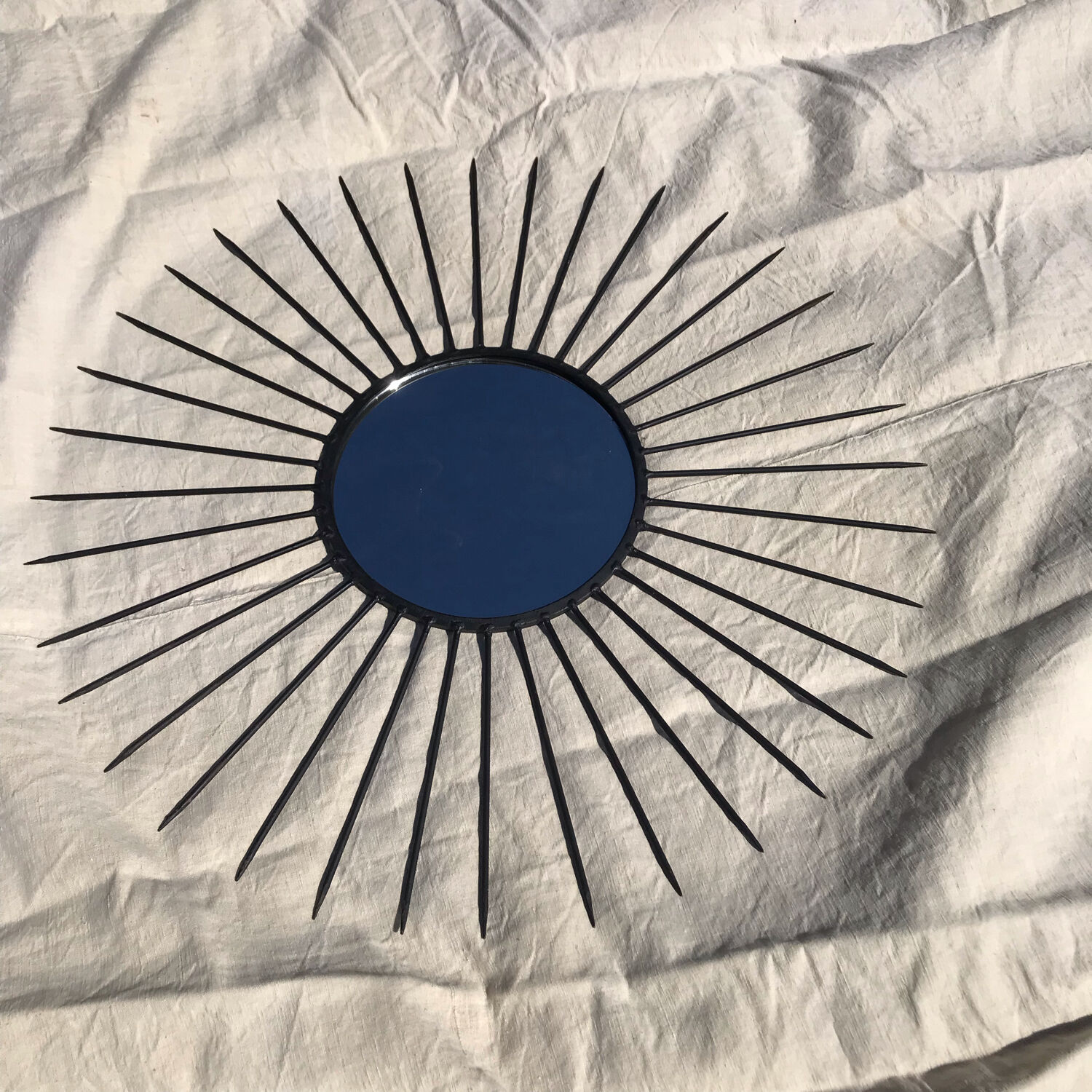 Vintage black metal sun mirror 1950