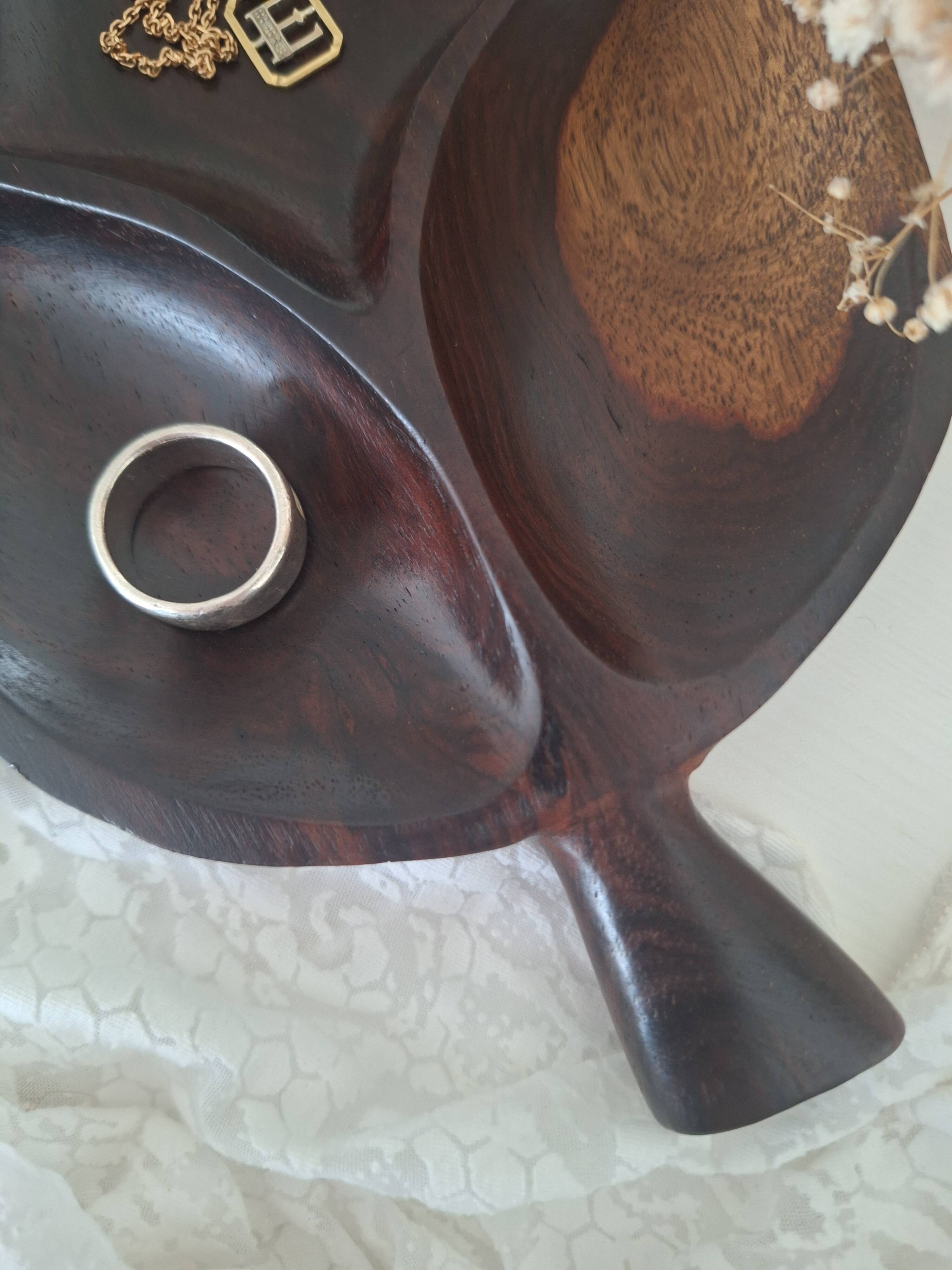 Solid wood pocket emptier