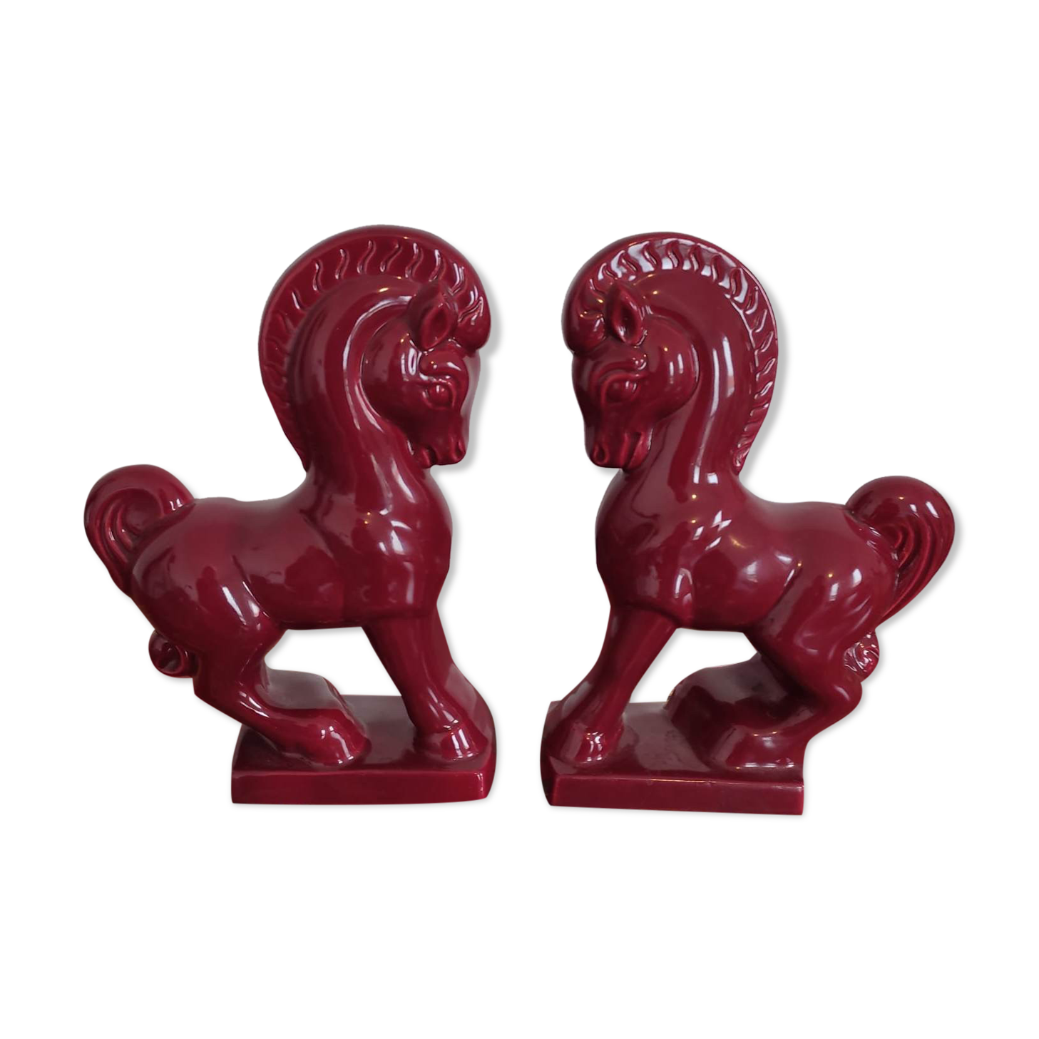 Pair of red porcelain horse bookends
