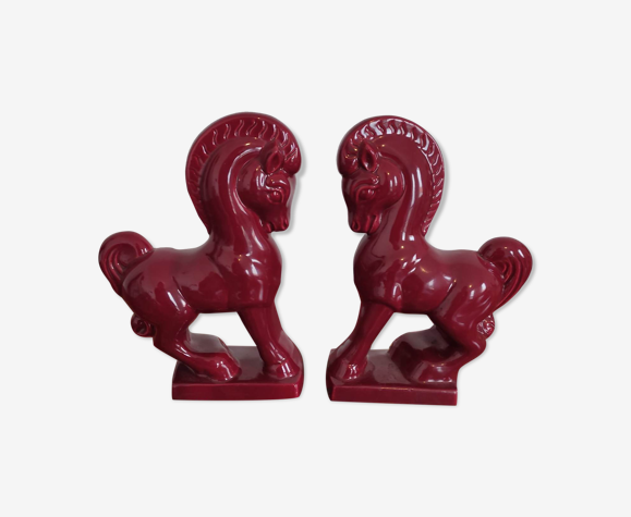 Pair of red porcelain horse bookends