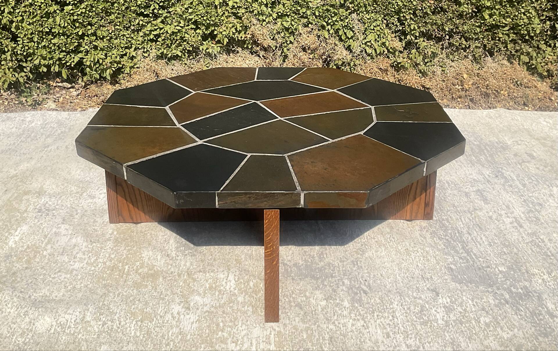 Brutalist octagonal coffee table from the 1970s in solid oak and slate.