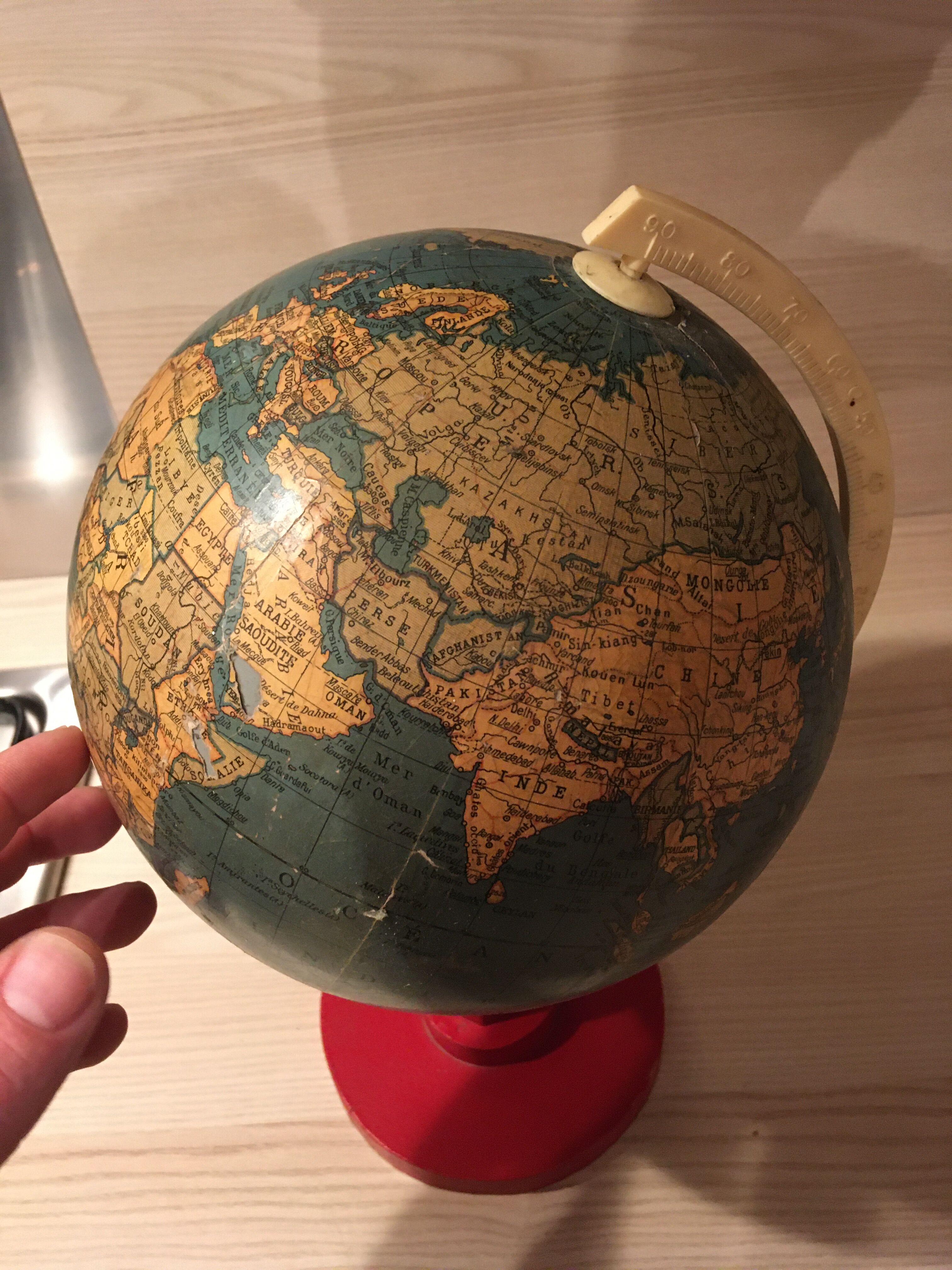 Earth globe ancient wooden foot