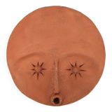 Round ceramic wall mask inspired by Africa, 1980s.
