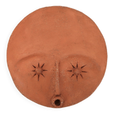 Round ceramic wall mask inspired by Africa, 1980s.