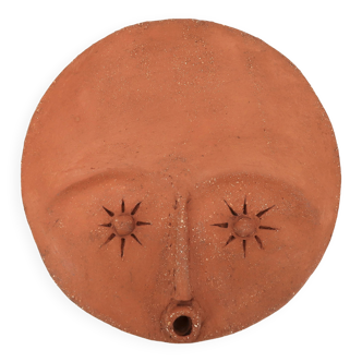 Round ceramic wall mask inspired by Africa, 1980s.