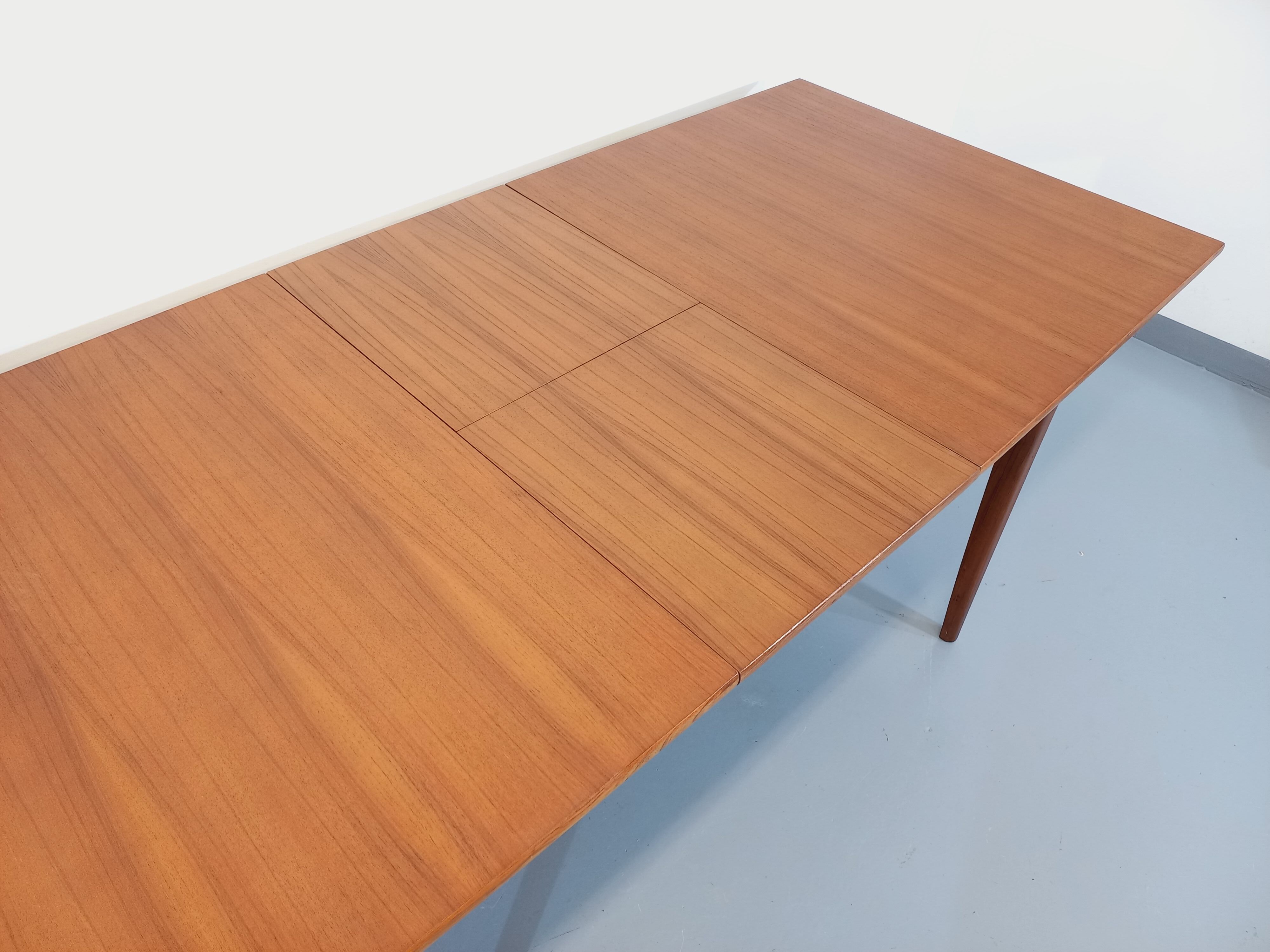 Vintage Scandinavian dining table from 50s 60s teak with extension