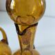 Duo of blown glass carafes – Biot signed – Bubbled amber glass