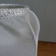 Turned wood lamp with fabric lampshade
