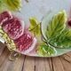 Antique majolica plate – raised strawberry decoration – gilding