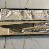 Leg cutlery set. Silver handles.