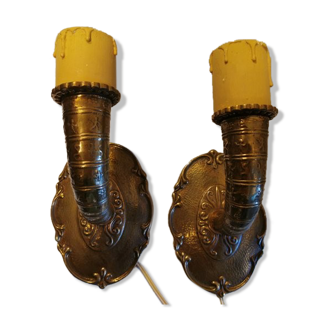 A set of wall lamps in solid brass