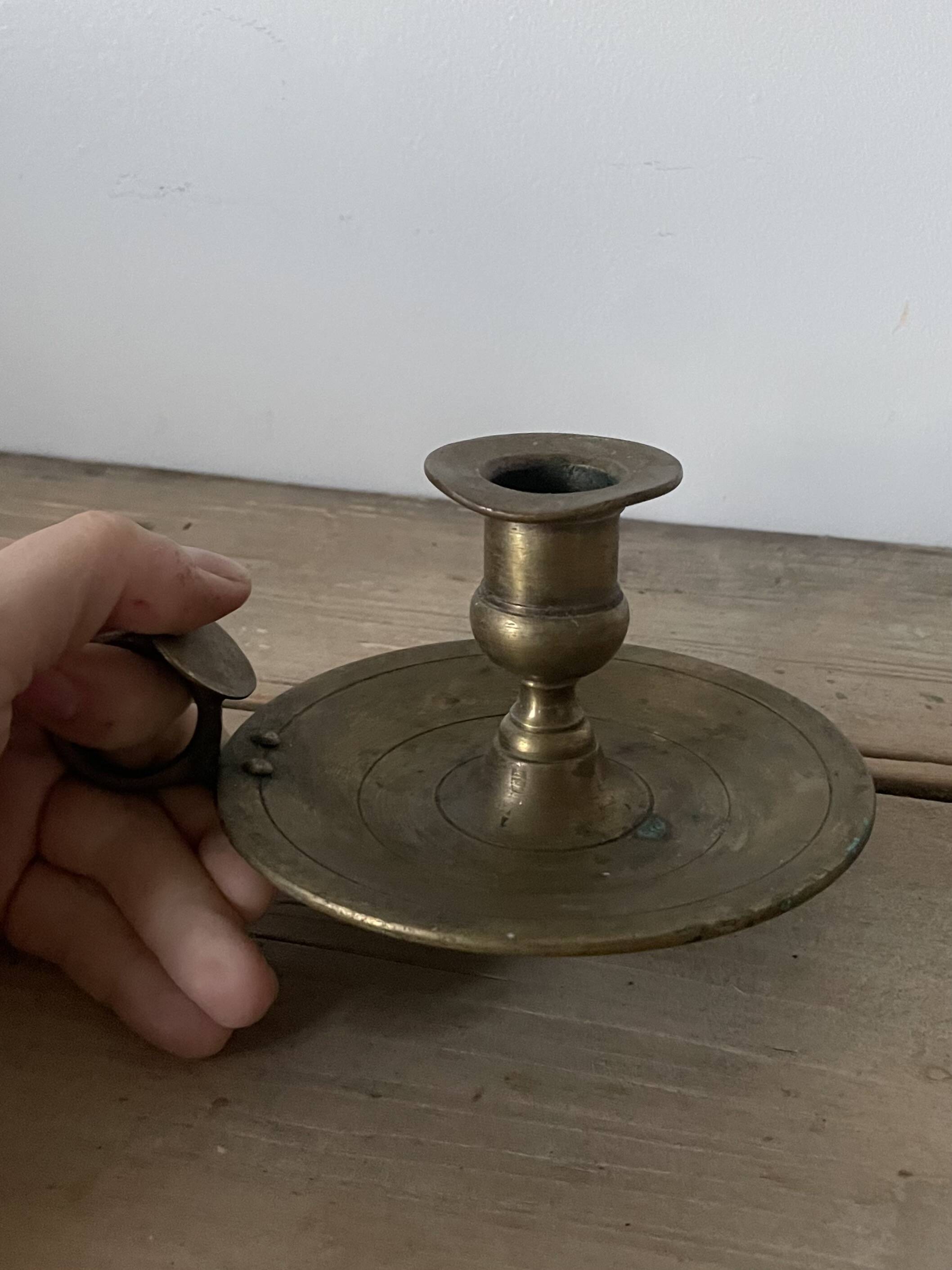Old brass candle holder