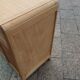 Vintage commode with tapered legs.
