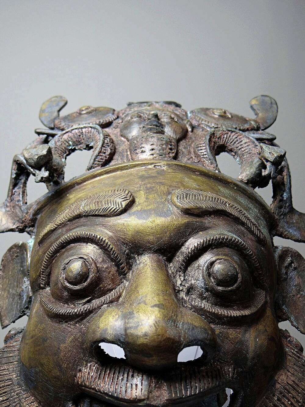 Vintage African bronze mask from Bamoun, Cameroon
