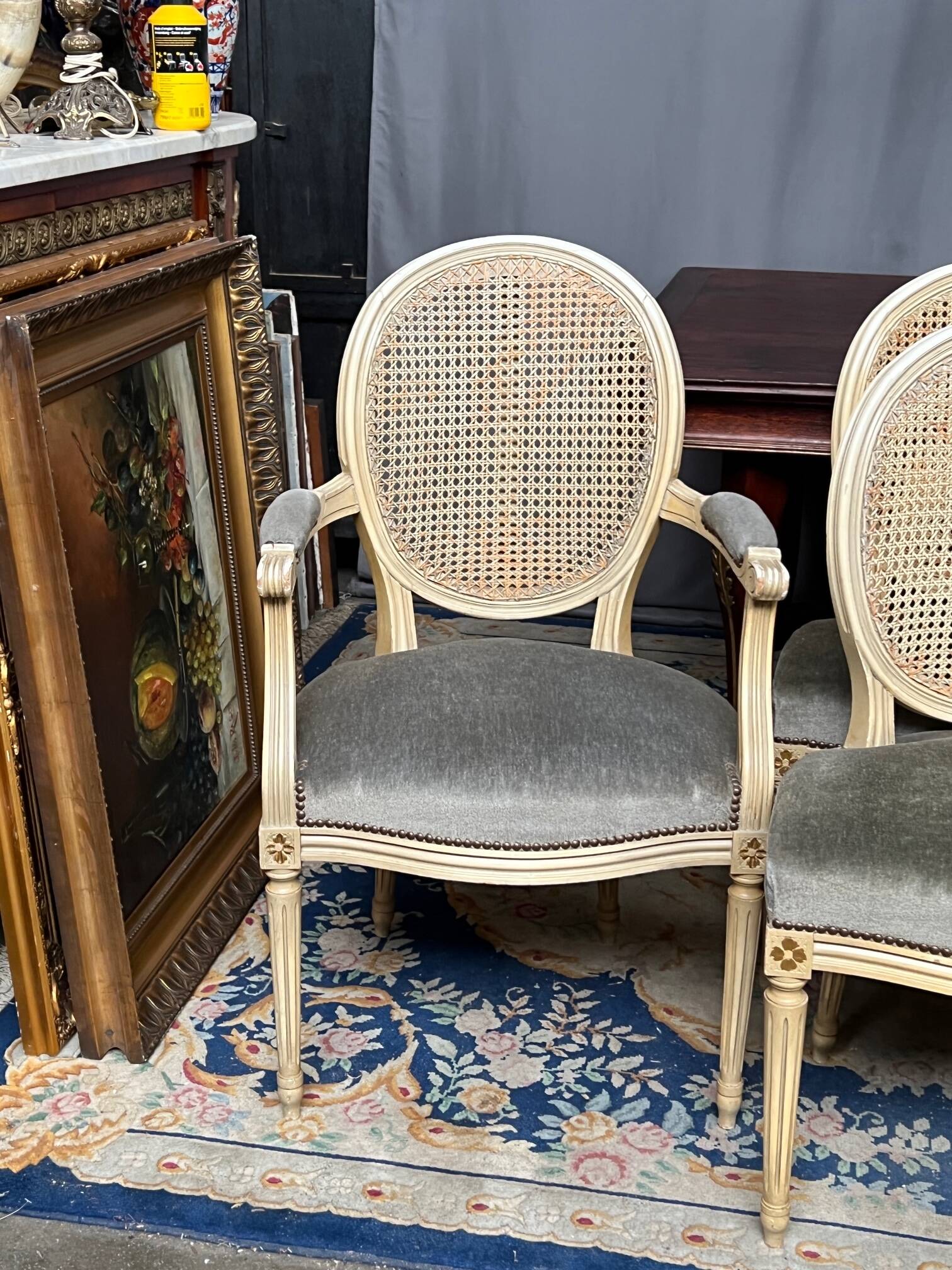Set of four Louis XVI style chairs and two armchairs.