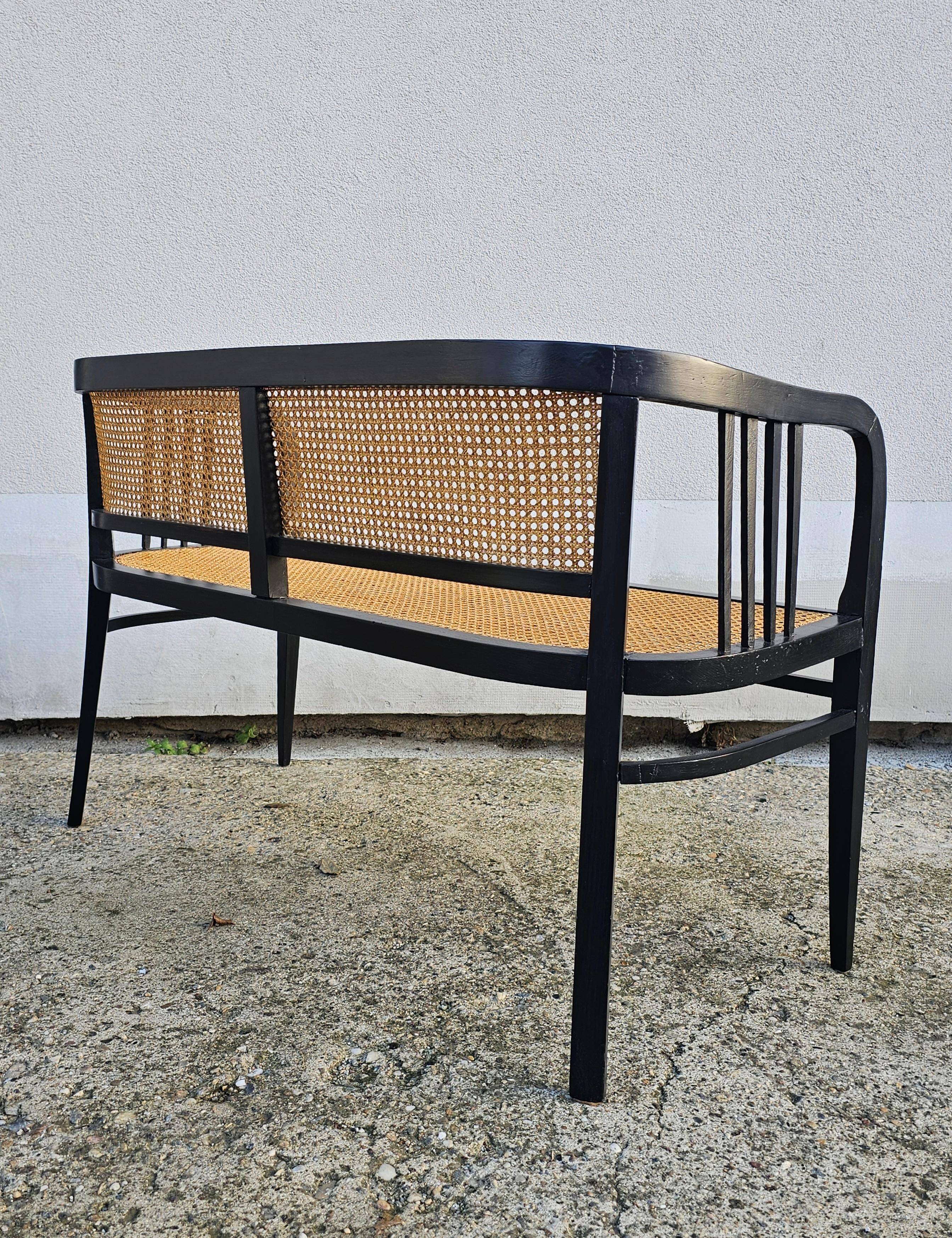Vienna Secession beech canapé with cane seat and backrest.