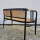 Vienna Secession beech canapé with cane seat and backrest.
