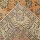 Tapis vintage à motifs floraux orange et noirs