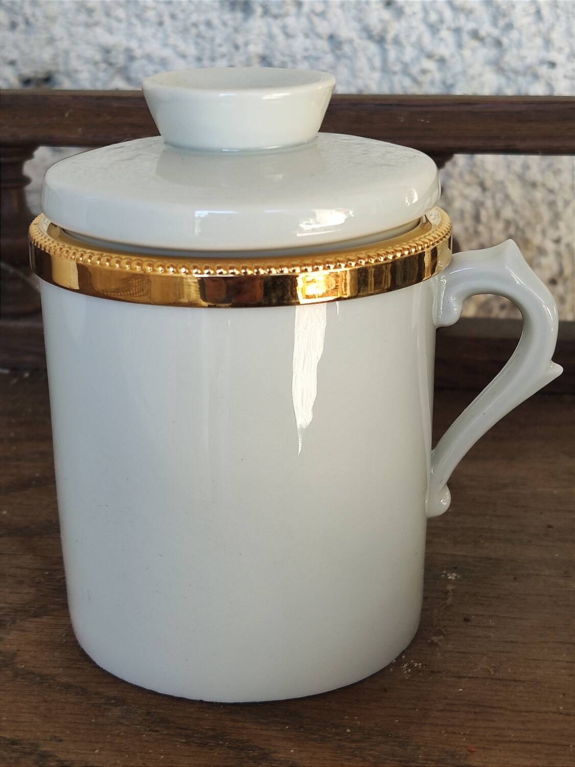 2 white and gold Limoges porcelain tea cups