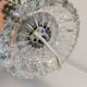 Table lamp made of transparent crystal glass and silver colored spacers.