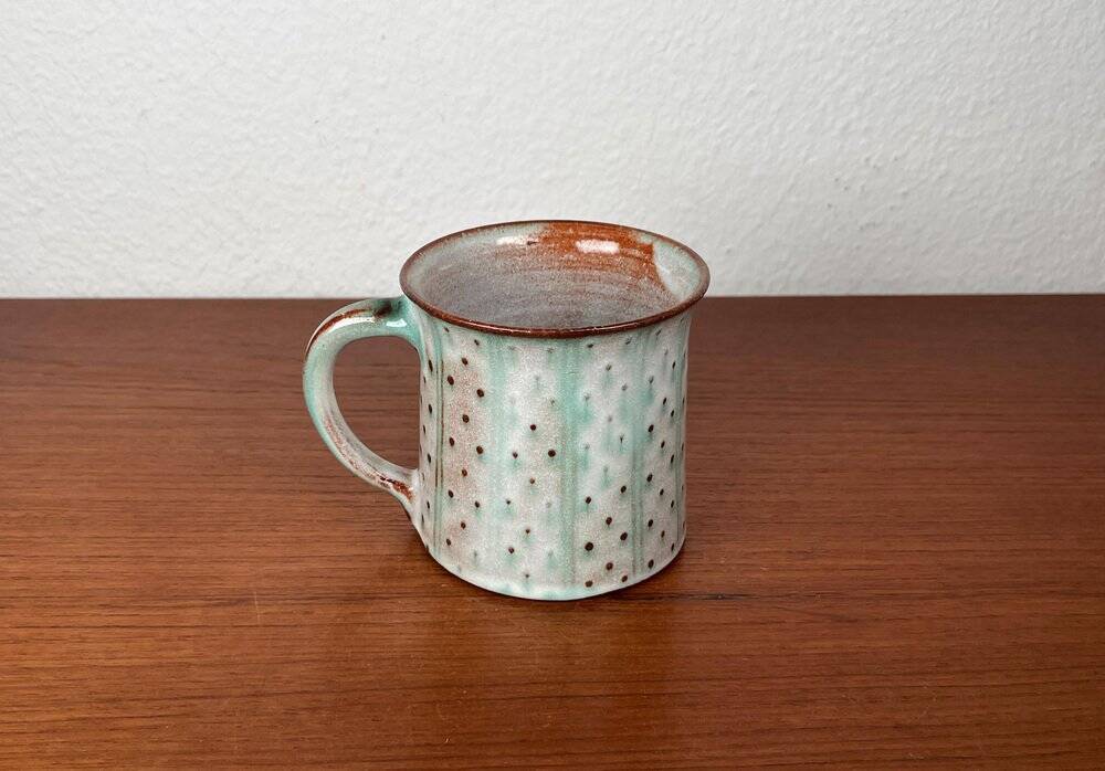 Mid-century modern studio pottery mug by Monika Maetzel, 1960s.