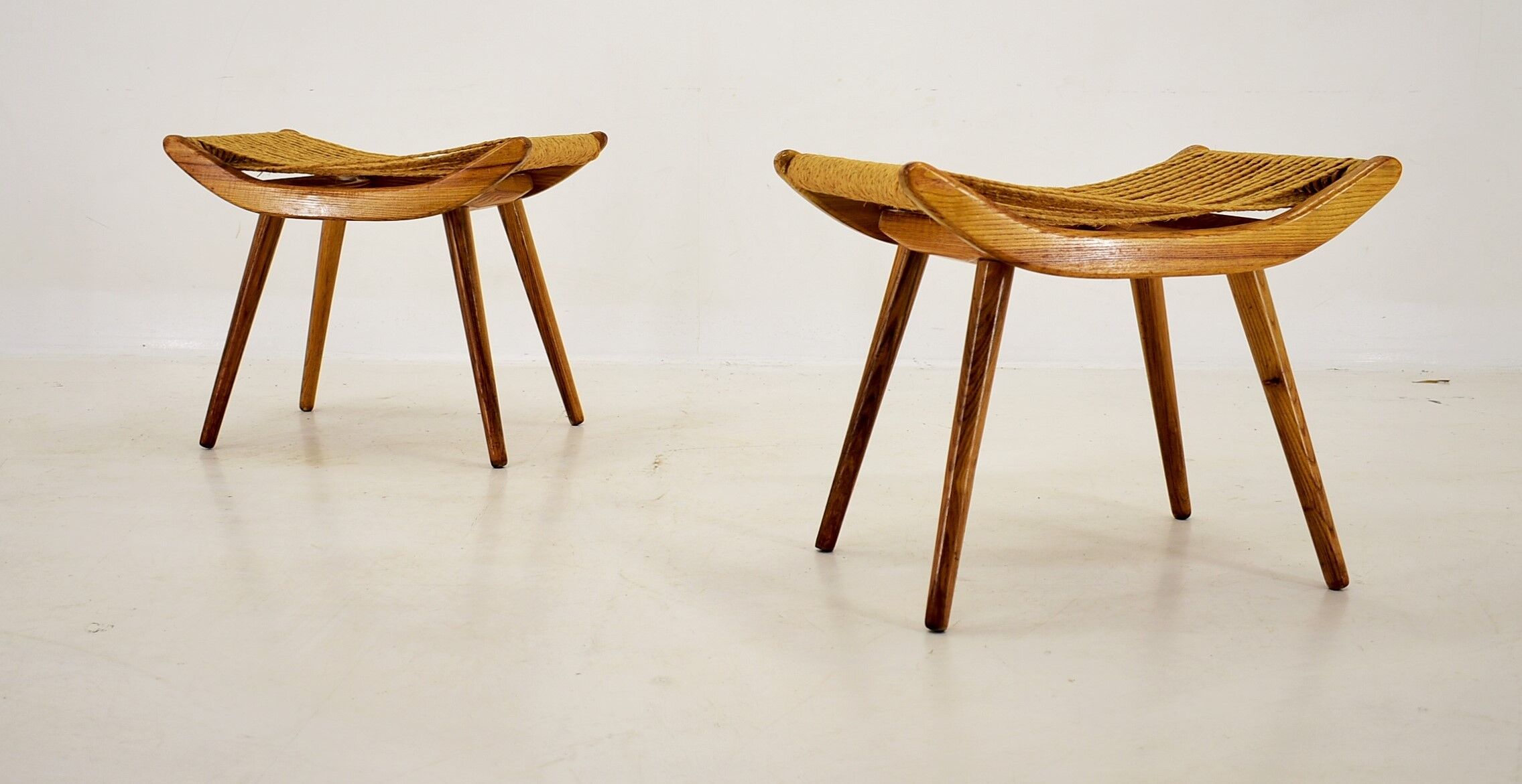 Pair of beech straw stools, 1960s, Czechoslovakia