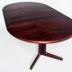 Scandinavian dining table with two extensions.Gudme Mobelfabrik. Rosewood. Denmark, 1960s