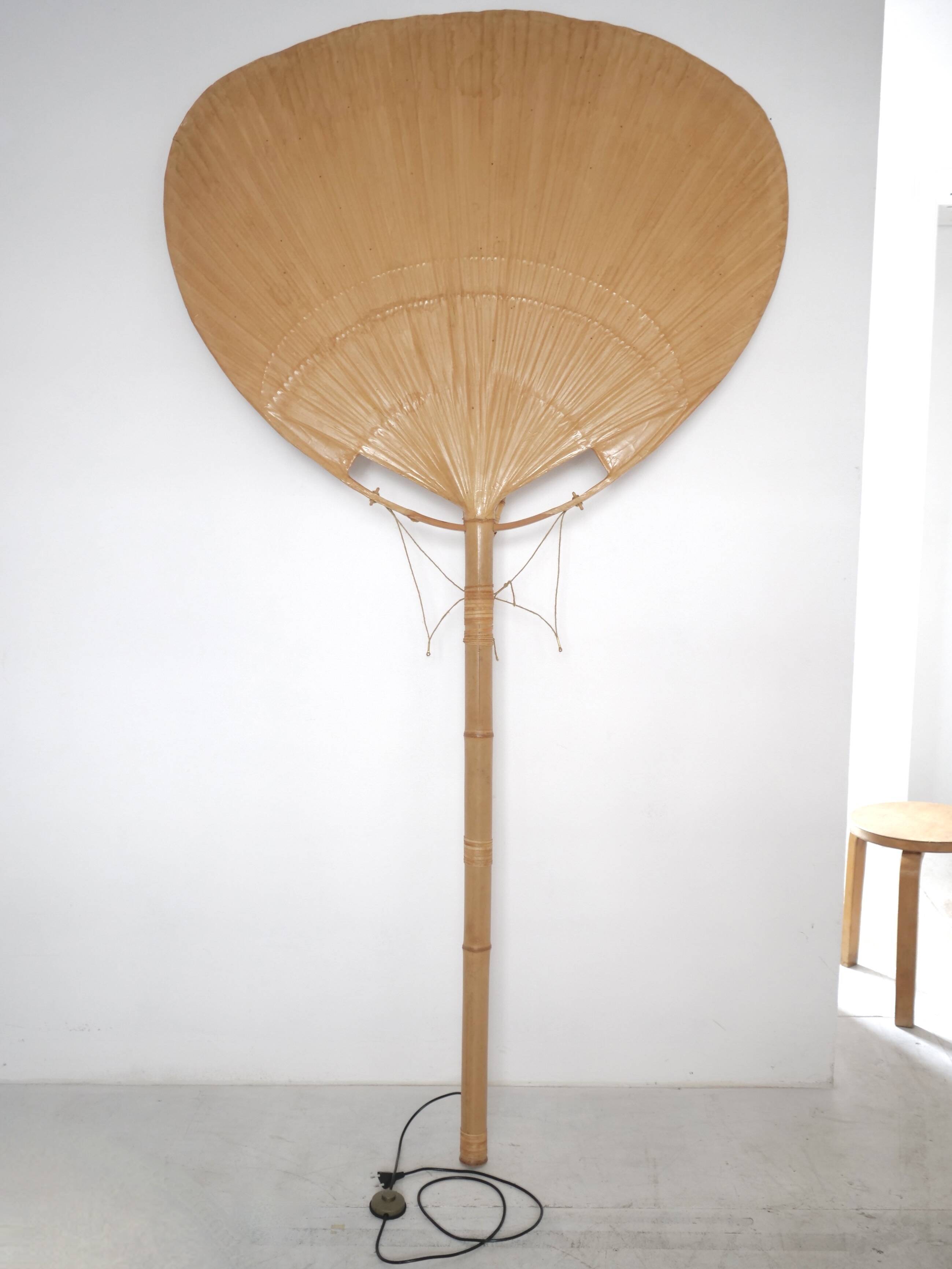 Large-format Uchiwa light fixture designed by Ingo Maurer