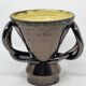 Jean Austruy ear vase in metallic black ceramic, France 1950.