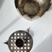 Picture of a lotus flower with a silver metal candlestick.