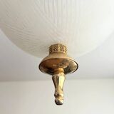 Suspension globe en verre et laiton