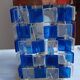 1970s designer table lamp with blue and clear plexiglass pendants.